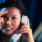 Frustrated woman on phone